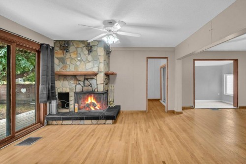 131 2 Avenue North, Vulcan, AB - Indoor Photo Showing Living Room With Fireplace