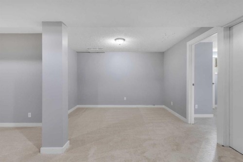 164 Deerview Way Se, Calgary, AB - Indoor Photo Showing Other Room
