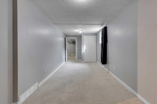 164 Deerview Way Se, Calgary, AB - Indoor Photo Showing Other Room