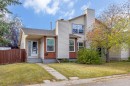 164 Deerview Way Se, Calgary, AB  - Outdoor With Facade 