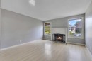 164 Deerview Way Se, Calgary, AB  - Indoor Photo Showing Living Room With Fireplace 