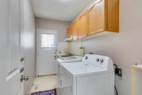 33 Shawnee View Sw, Calgary, AB - Indoor Photo Showing Laundry Room