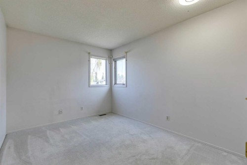 33 Shawnee View Sw, Calgary, AB - Indoor Photo Showing Other Room