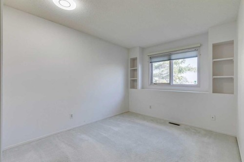 33 Shawnee View Sw, Calgary, AB - Indoor Photo Showing Other Room