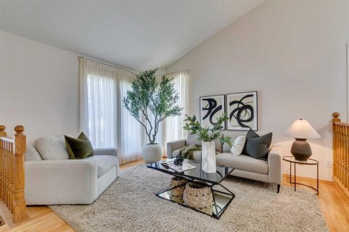 33 Shawnee View Sw, Calgary, AB - Indoor Photo Showing Living Room