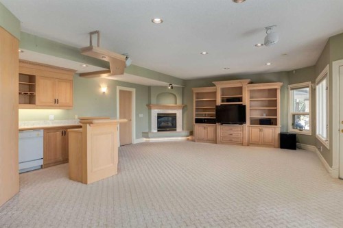 14 Patina Lane Sw, Calgary, AB - Indoor With Fireplace