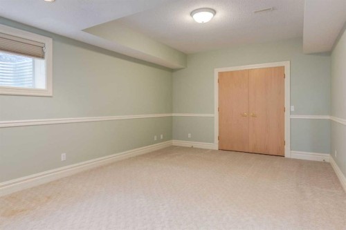 14 Patina Lane Sw, Calgary, AB - Indoor Photo Showing Other Room