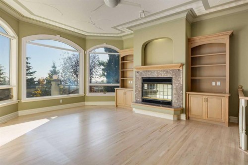 14 Patina Lane Sw, Calgary, AB - Indoor With Fireplace