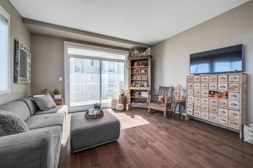 1302-522 Cranford Drive Se, Calgary, AB - Indoor Photo Showing Living Room