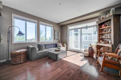 1302-522 Cranford Drive Se, Calgary, AB - Indoor Photo Showing Living Room