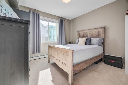 1302-522 Cranford Drive Se, Calgary, AB - Indoor Photo Showing Bedroom