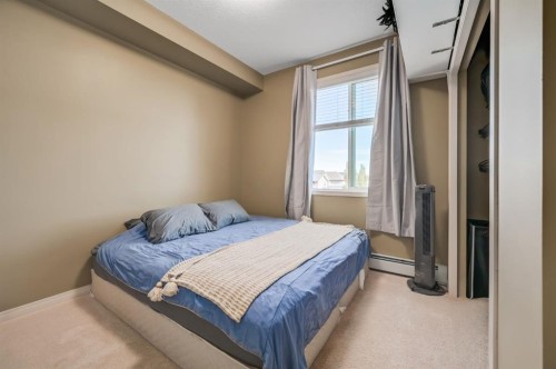 1302-522 Cranford Drive Se, Calgary, AB - Indoor Photo Showing Bedroom