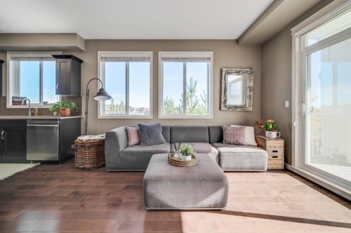 1302-522 Cranford Drive Se, Calgary, AB - Indoor Photo Showing Living Room