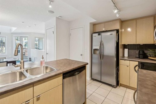 229 Mckenzie Towne Lane Se, Calgary, AB - Indoor Photo Showing Kitchen With Double Sink