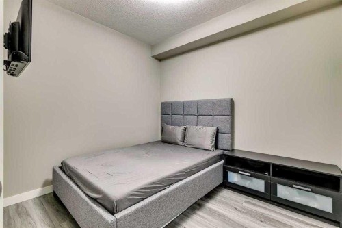 202-20 Sage Hill Nw, Calgary, AB - Indoor Photo Showing Bedroom