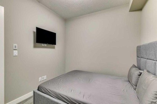 202-20 Sage Hill Nw, Calgary, AB - Indoor Photo Showing Bedroom
