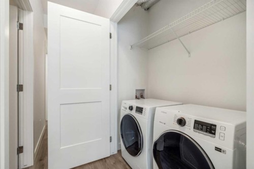 202-20 Sage Hill Nw, Calgary, AB - Indoor Photo Showing Laundry Room