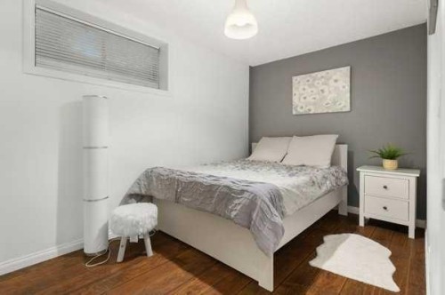 110 Cougar Ridge Circle Sw, Calgary, AB - Indoor Photo Showing Bedroom