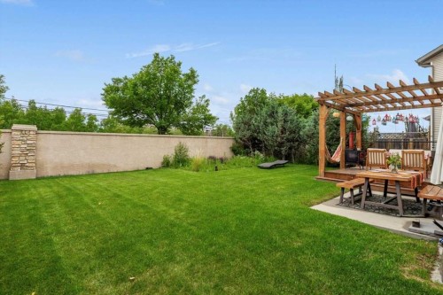 110 Cougar Ridge Circle Sw, Calgary, AB - Outdoor With Deck Patio Veranda With Backyard