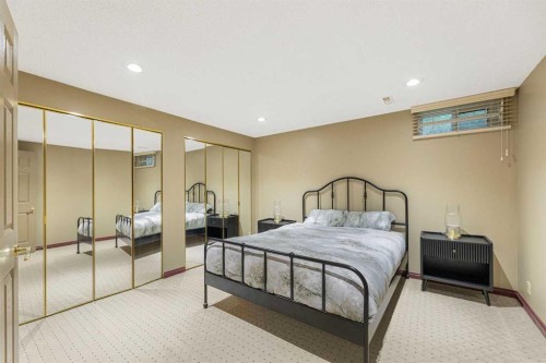 12235 Lake Fraser Way Se, Calgary, AB - Indoor Photo Showing Bedroom