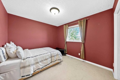 10345 Hamptons Boulevard Nw, Calgary, AB - Indoor Photo Showing Bedroom