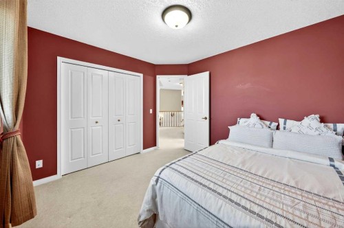 10345 Hamptons Boulevard Nw, Calgary, AB - Indoor Photo Showing Bedroom