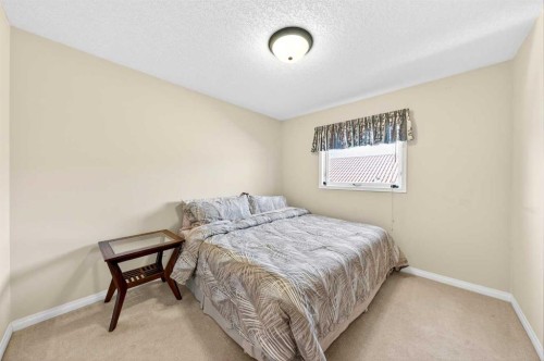 10345 Hamptons Boulevard Nw, Calgary, AB - Indoor Photo Showing Bedroom