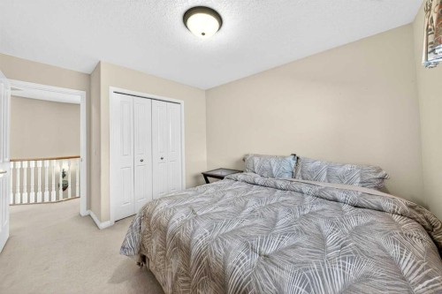10345 Hamptons Boulevard Nw, Calgary, AB - Indoor Photo Showing Bedroom