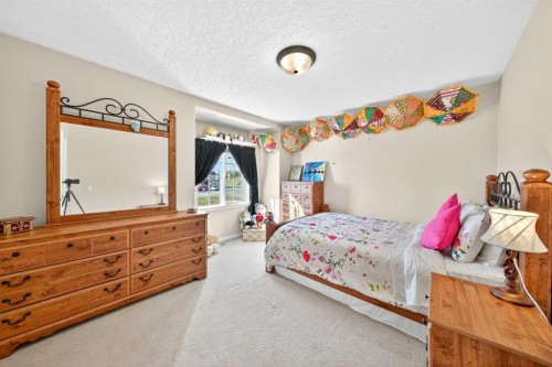 10345 Hamptons Boulevard Nw, Calgary, AB - Indoor Photo Showing Bedroom