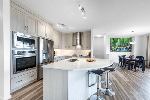 29 Cityside Link Ne, Calgary, AB - Indoor Photo Showing Kitchen With Stainless Steel Kitchen With Double Sink With Upgraded Kitchen