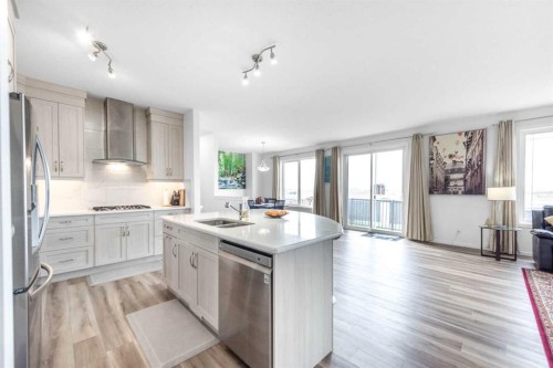 29 Cityside Link Ne, Calgary, AB - Indoor Photo Showing Kitchen With Stainless Steel Kitchen With Double Sink With Upgraded Kitchen