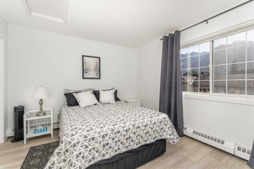 205-112 Kananaskis Way, Canmore, AB - Indoor Photo Showing Bedroom