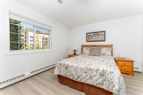 205-112 Kananaskis Way, Canmore, AB - Indoor Photo Showing Bedroom