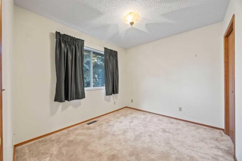 52 Sandarac Circle Nw, Calgary, AB - Indoor Photo Showing Other Room