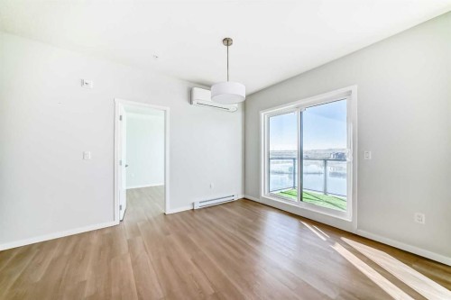 1305-42 Cranbrook Gardens Se, Calgary, AB - Indoor Photo Showing Other Room