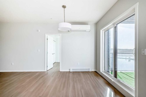 1305-42 Cranbrook Gardens Se, Calgary, AB - Indoor Photo Showing Other Room