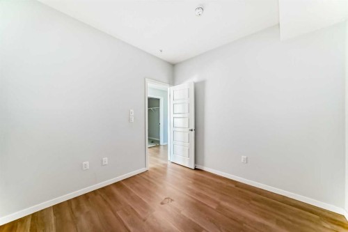 1305-42 Cranbrook Gardens Se, Calgary, AB - Indoor Photo Showing Other Room