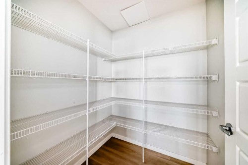 1305-42 Cranbrook Gardens Se, Calgary, AB - Indoor With Storage