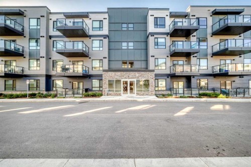 1305-42 Cranbrook Gardens Se, Calgary, AB - Outdoor With Balcony With Facade
