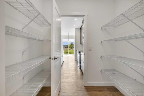 211 Creekstone Row Sw, Calgary, AB - Indoor With Storage