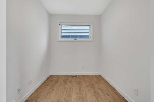211 Creekstone Row Sw, Calgary, AB - Indoor Photo Showing Other Room