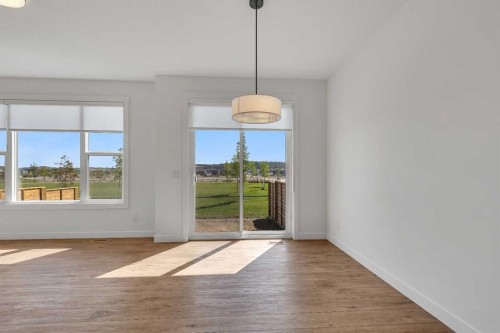 211 Creekstone Row Sw, Calgary, AB - Indoor Photo Showing Other Room