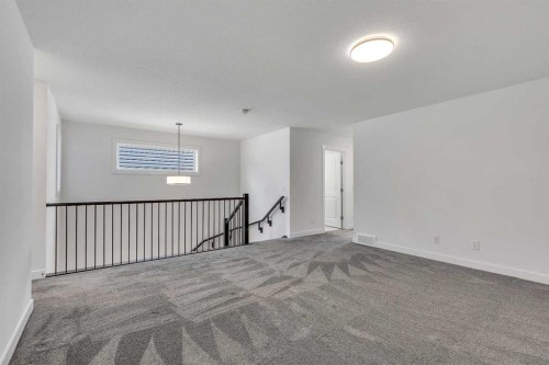 211 Creekstone Row Sw, Calgary, AB - Indoor Photo Showing Other Room
