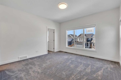 211 Creekstone Row Sw, Calgary, AB - Indoor Photo Showing Other Room