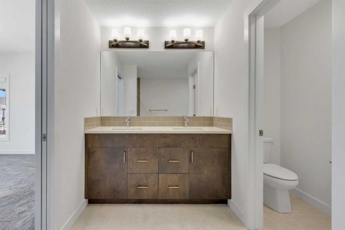 211 Creekstone Row Sw, Calgary, AB - Indoor Photo Showing Bathroom
