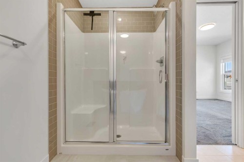 211 Creekstone Row Sw, Calgary, AB - Indoor Photo Showing Bathroom