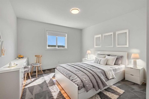 211 Creekstone Row Sw, Calgary, AB - Indoor Photo Showing Bedroom