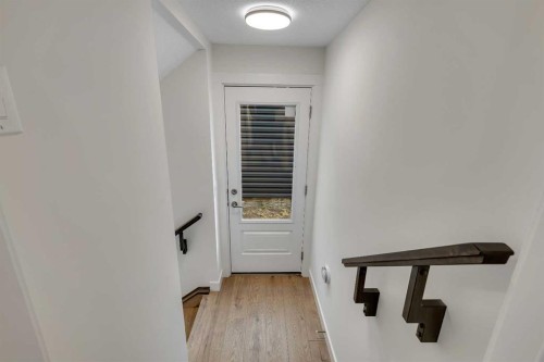 211 Creekstone Row Sw, Calgary, AB - Indoor Photo Showing Other Room