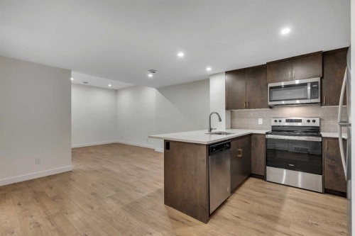 211 Creekstone Row Sw, Calgary, AB - Indoor Photo Showing Kitchen With Stainless Steel Kitchen