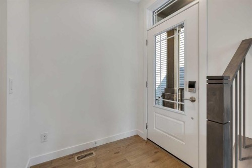 211 Creekstone Row Sw, Calgary, AB - Indoor Photo Showing Other Room
